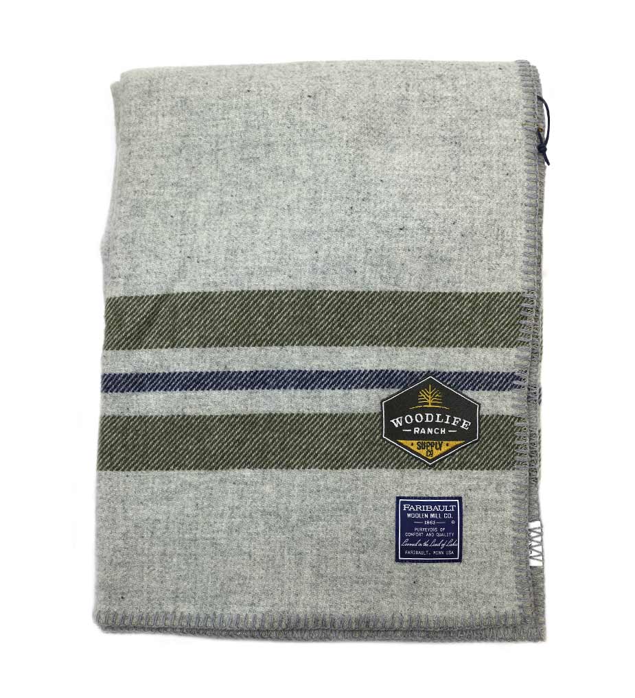 https://woodliferanch.com/wp-content/uploads/2021/03/gray_green_blanket_hero.jpg